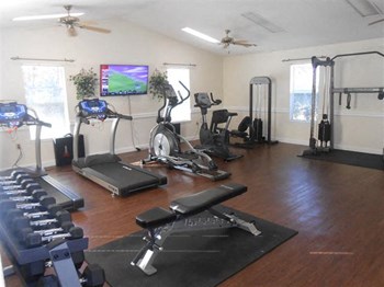 free weights and weighted machines in fitness center - Photo Gallery 6