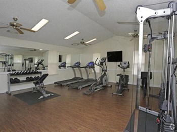 cardio machines and weighted machines in fitness center - Photo Gallery 5