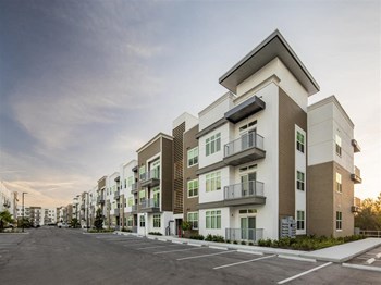 Icaria on Pinellas apartments in Tarpon Springs, FL photo of apartment building and parking lot - Photo Gallery 34