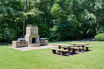 The Falls at Sope Creek Apartments in Marietta Georgia photo of outdoor seating area and firepit - Photo Gallery 21