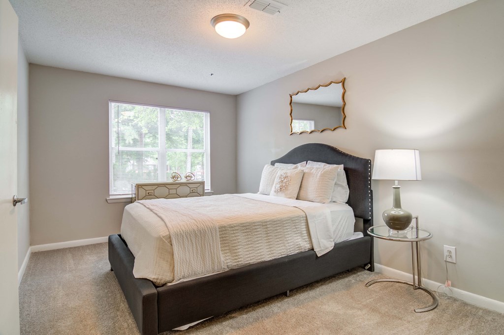 Large bedroom with bright windows at Duluth 3 & 4 bedroom apartments