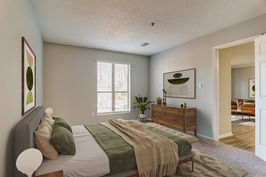 Bright and spacious bedroom at Forest Glen apartments in Austell, GA 30106, near South Cobb County and Douglasville.