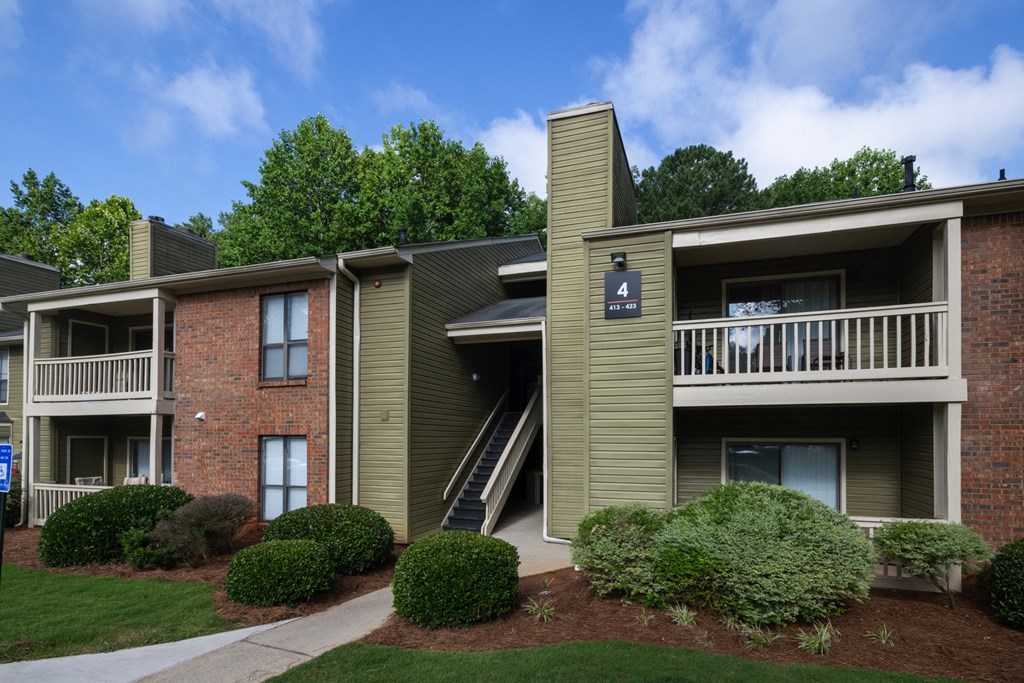 “Exterior view of apartment buildings at Forest Glen in Austell, GA 30106, near South Cobb County and Douglasville.