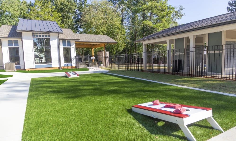 Arlowe Townhomes in Smyrna GA photo of grounds area with corn hole game