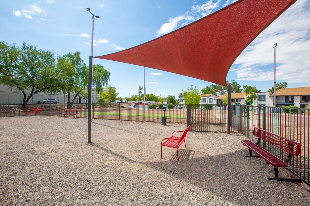 our apartments have a park with benches and a canopy