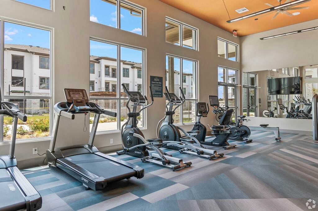 the gym at the flats at big tex apartments