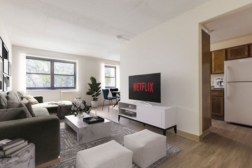 a living room with a couch and a tv