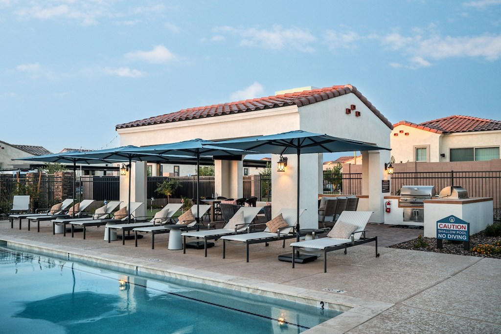 A pool with a caution no diving sign.