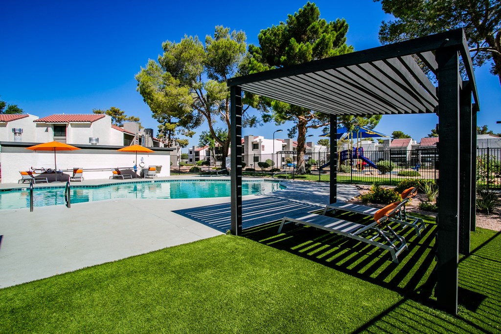 the swimming pool at the preserve at polo terrace apartments