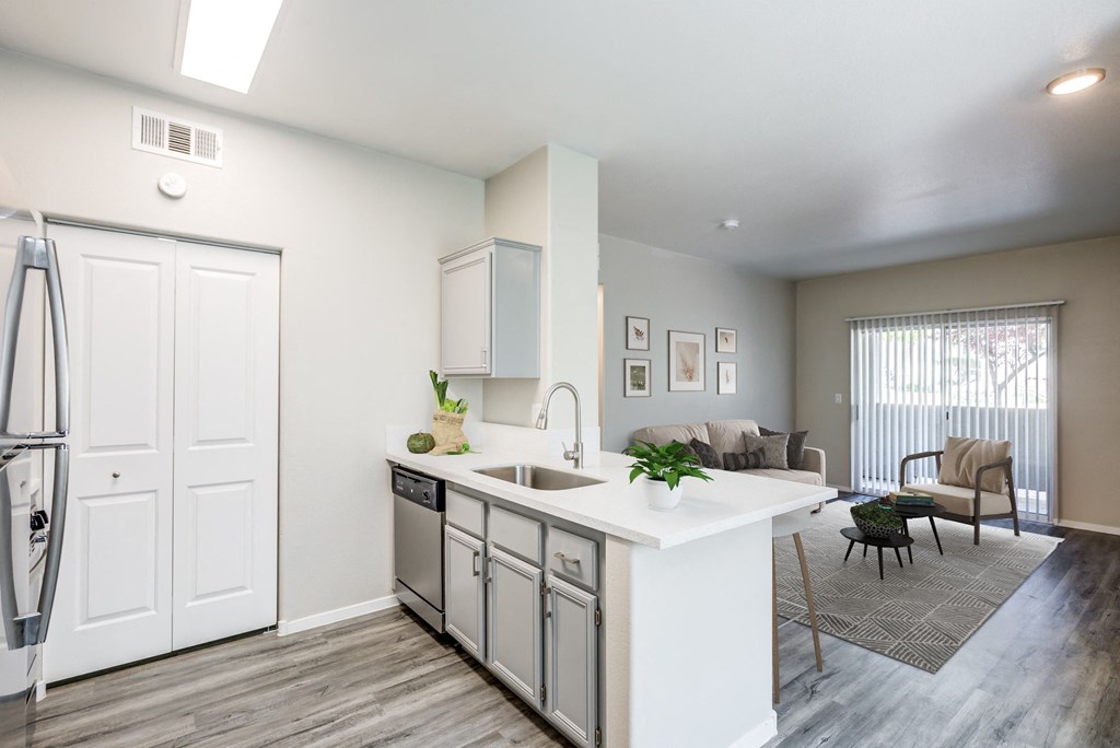 the preserve at ballantyne commons apartments clubhouse with kitchen and living room