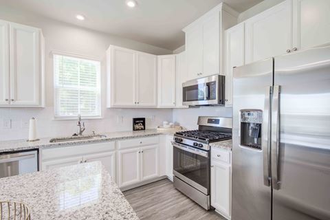 kitchen with stainless steel appliances  at Harrison Landing Townhomes, Simpsonville, 29680