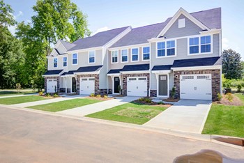 townhomes exterior with driveways - Photo Gallery 16