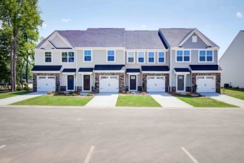townhomes exterior with driveways - Photo Gallery 17