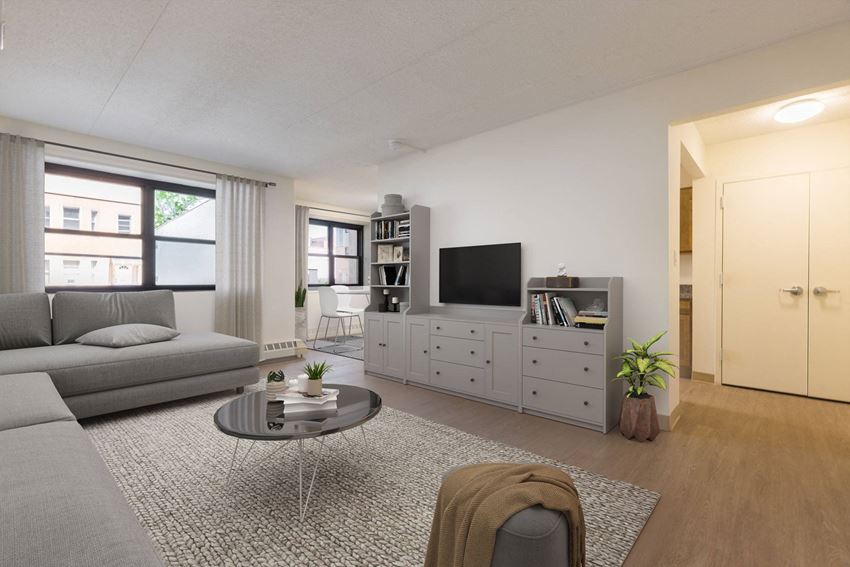 a living room with a couch and a tv