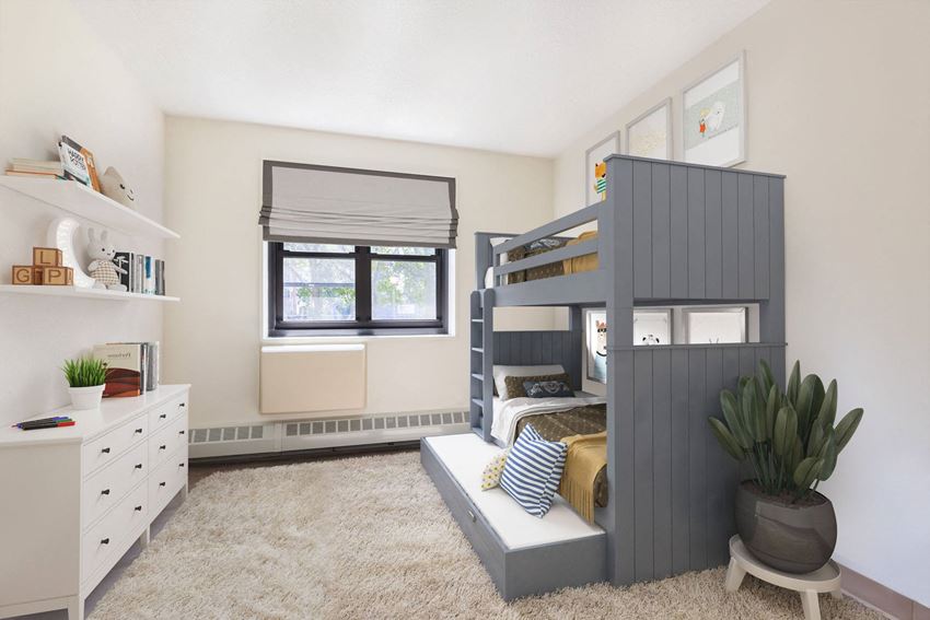 a bedroom with a bunk bed and a window
