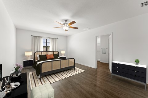 A bedroom with a bed, nightstand, and a dresser.