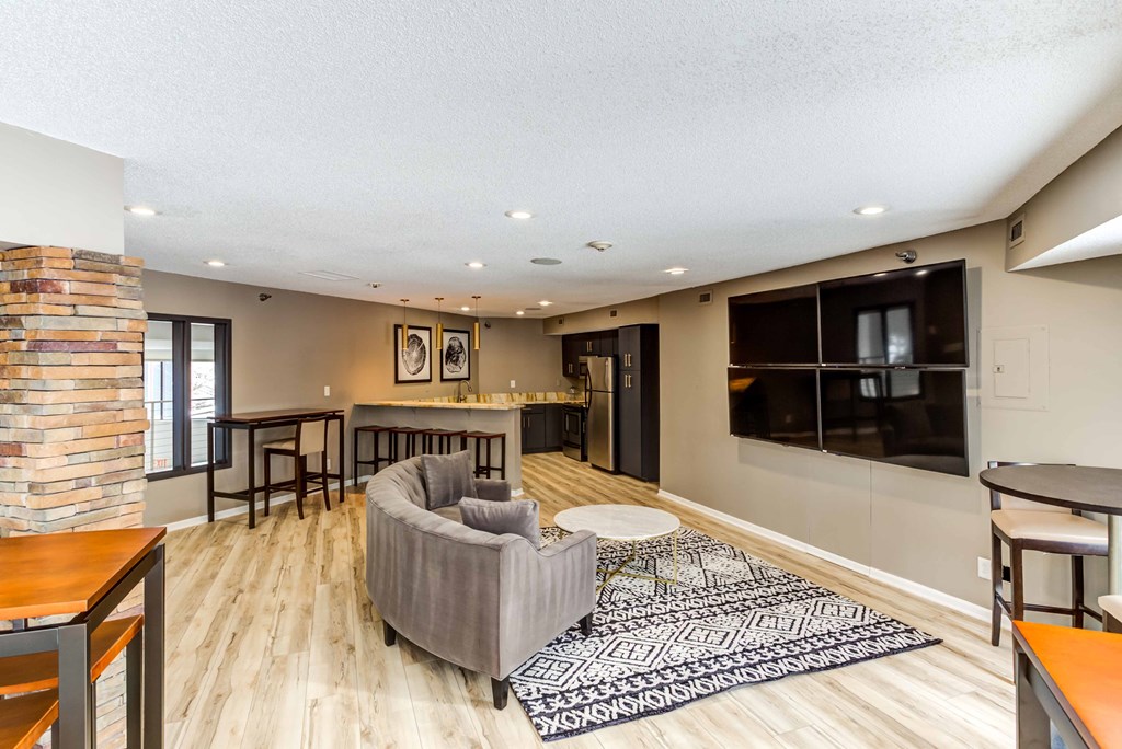 a living room with a couch and a tv