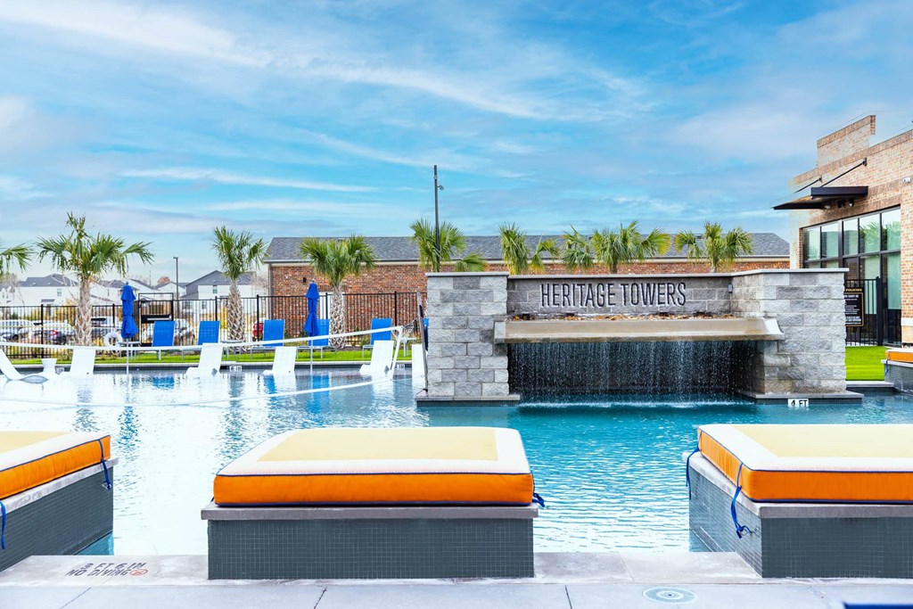 the swimming pool at the heritage village resort and spa