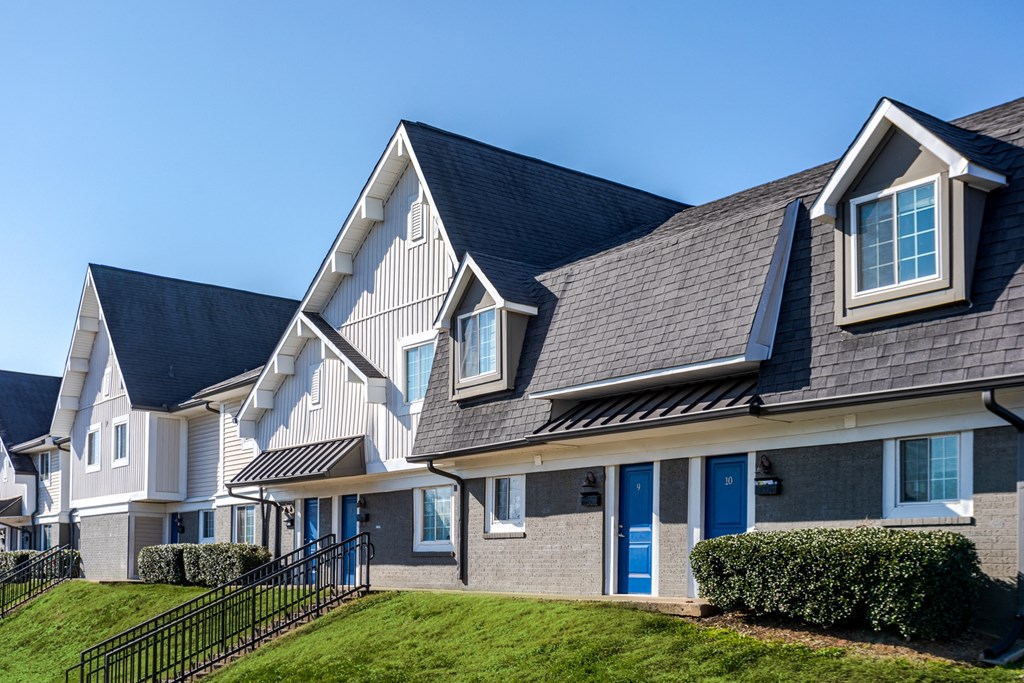Apartment building exterior surrounded by landscaping at Hickory Lake apartments in Antioch, TN 37013, near Southeast Nashville