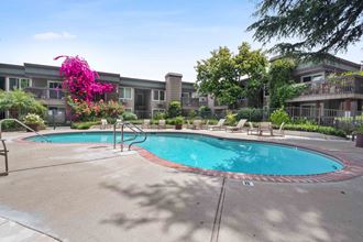 Santa Clara, CA, Apartments for Rent - Hidden Lake - Gated Pool with Lounge Chairs, Tables, Lush Landscaping