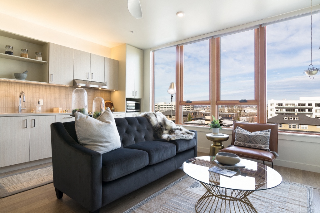 Portland Apartments - The Muse - Living-Room With Wood-Style Flooring, Led Lighting, And Modern Furniture