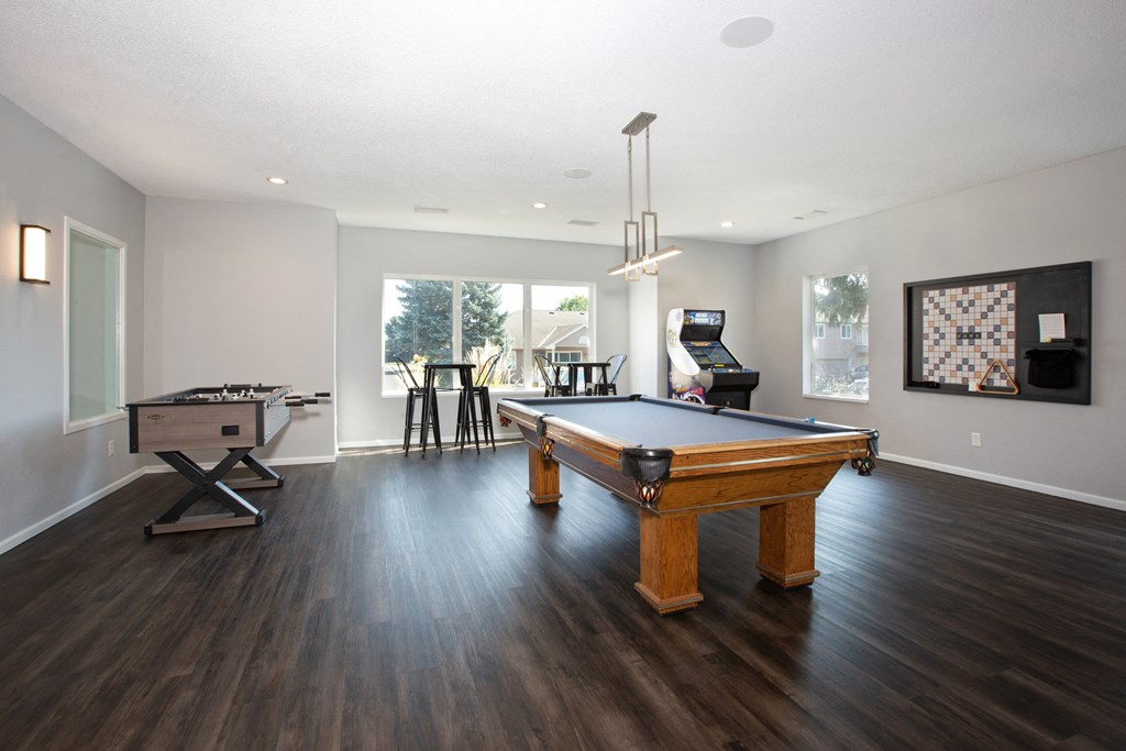 Hinton Height_Cottage Grove_MN_an open living room with a pool table and a piano