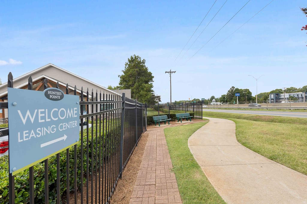 Sidewalk path within the community at Hunters Pointe apartments in Charlotte, NC 28213, near UNC Charlotte.