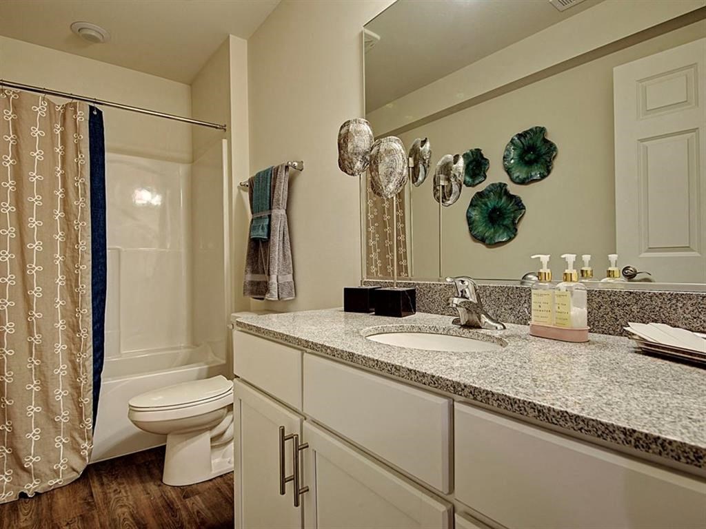 a bathroom with a sink and a toilet