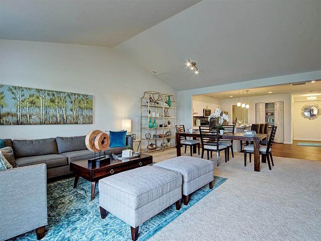 a living room with a couch and a table