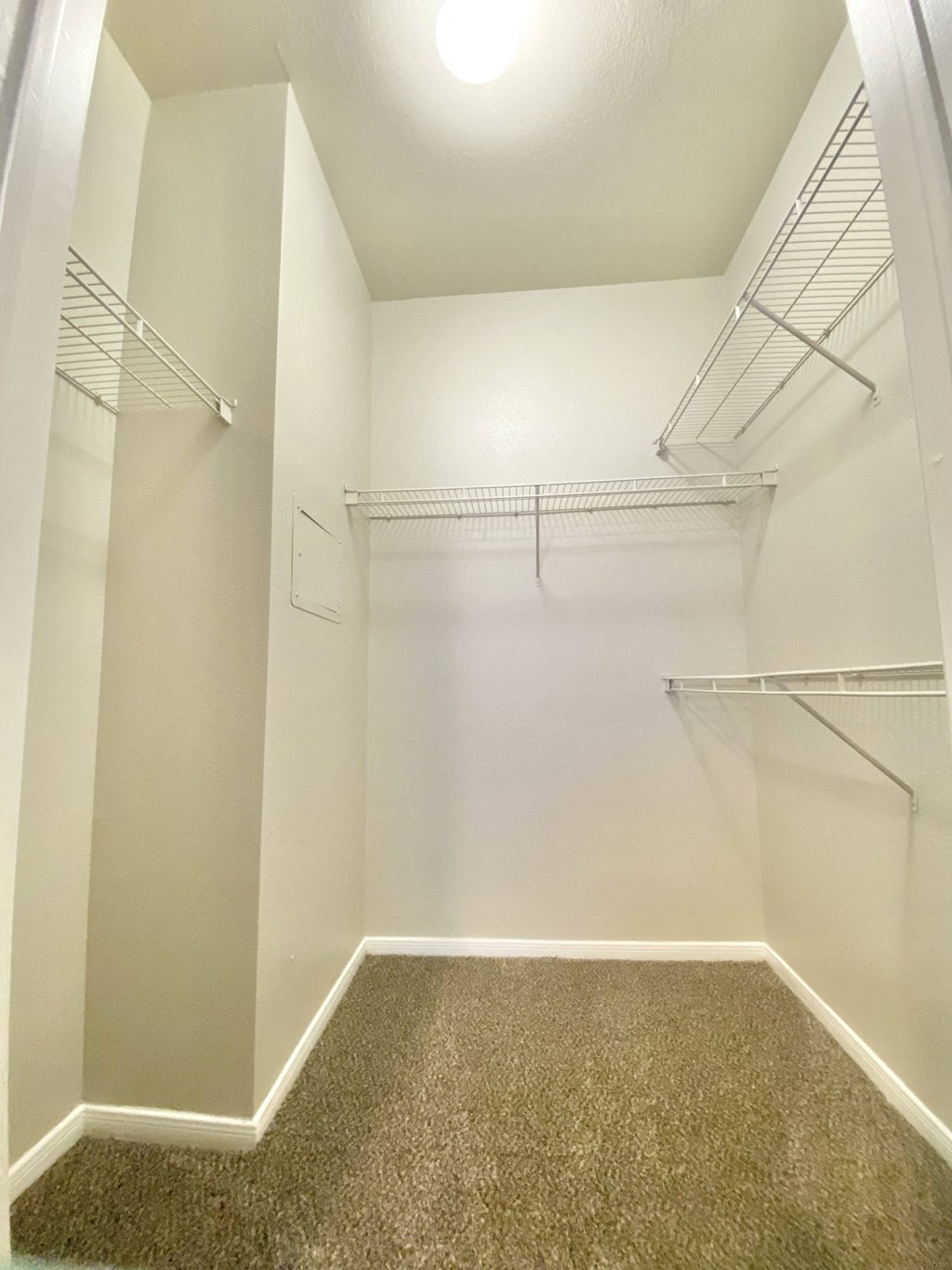 Walk in closet with space for cloth hangers
