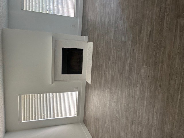 a room with a window and a radiator