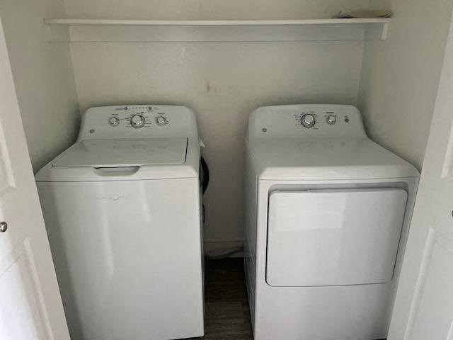 a white washer and a white dryer in a room