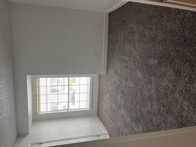 a window in a room with a white sill