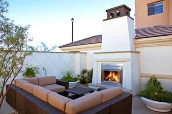 Two outdoor lounges with fireplace
