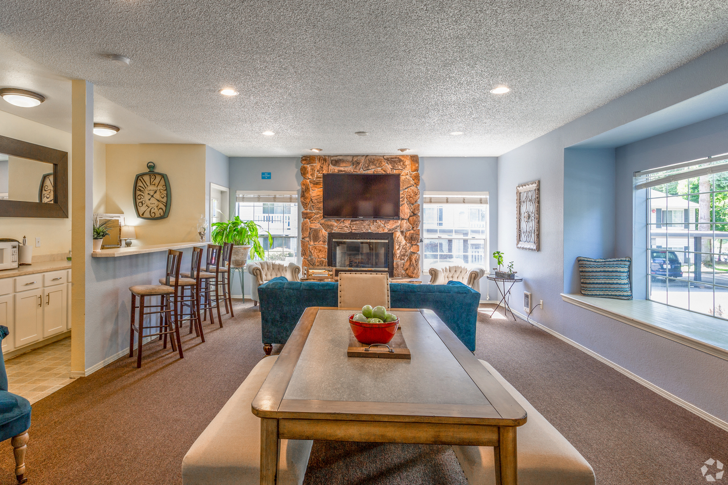 Clubhouse entertainment center features kitchen