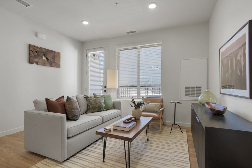 a living room with a couch and a coffee table