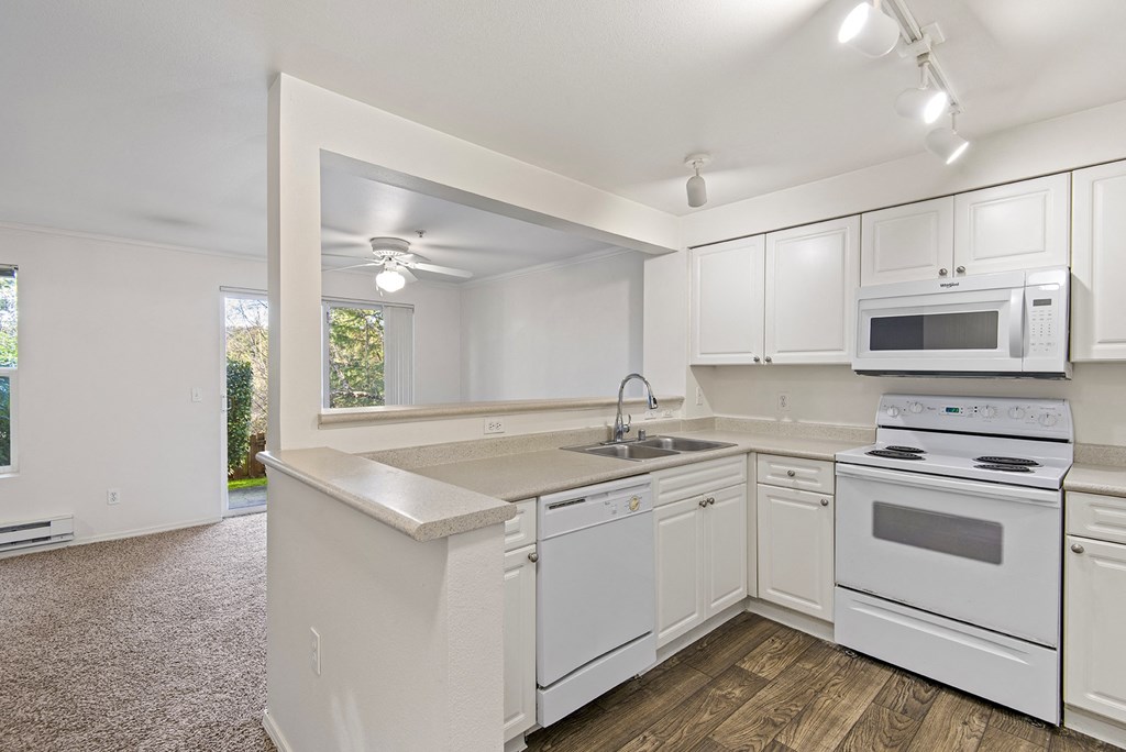 the preserve at ballantyne commons apartment kitchen with white appliances