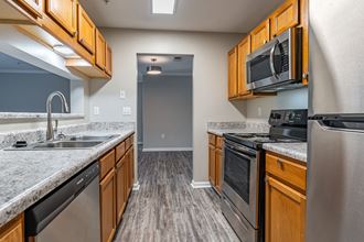 Lancaster Place Apartments in Calera Alabama photo of stainless steel appliances