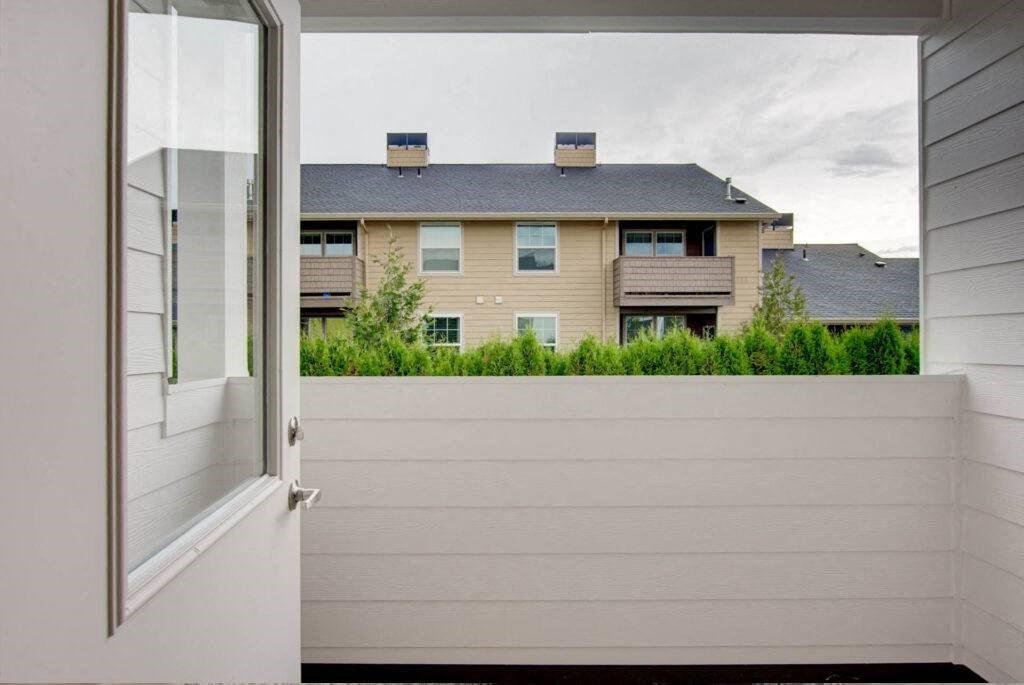a view of a house from the outside of a door