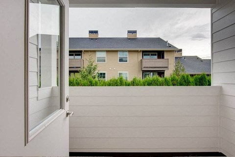 a view of a house from the outside of a door