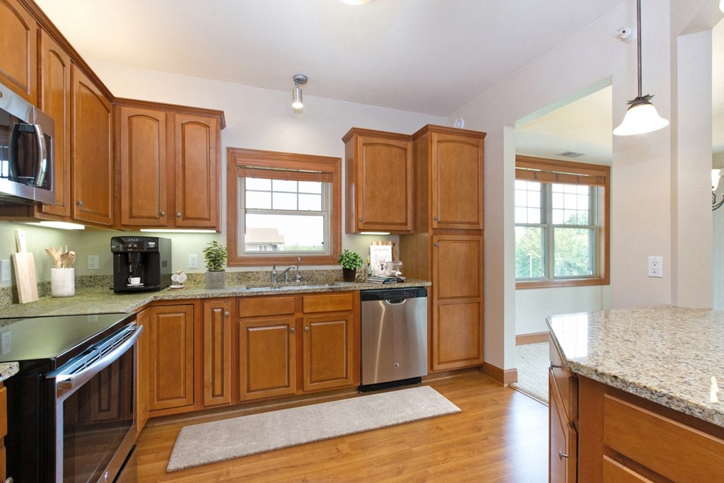 Laurel East End Apartments in Golden Valley, MN photo of a kitchen with wooden cabinets