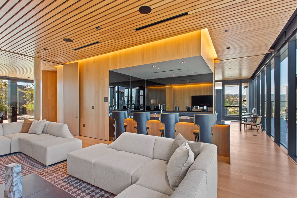 a view of the living room and kitchen from the dining room