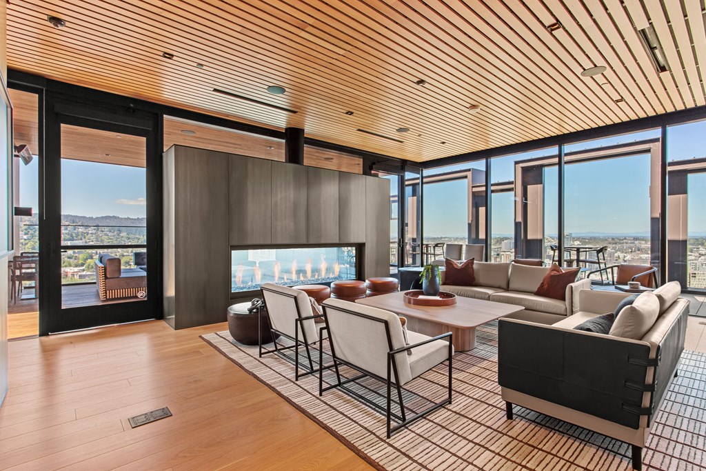a living room filled with furniture and a fire place