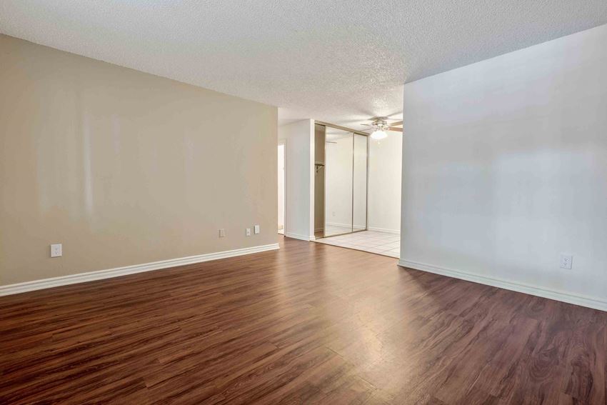 Fremont Apartments for Rent- Lincoln Glen Apartments Spacious Bedroom With Hardwood Style Flooring and Ceiling Fan