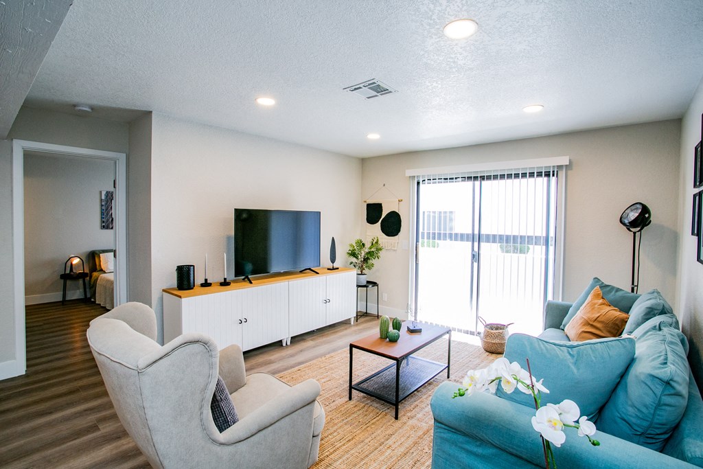 a living room with a couch and a tv