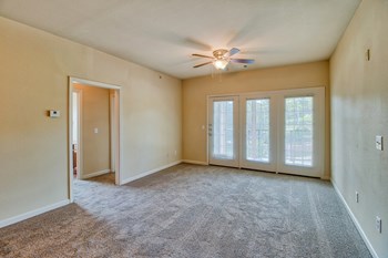 Parc at Metro Center Apartments in Nashville Tennessee photo of living room with natural light - Photo Gallery 4