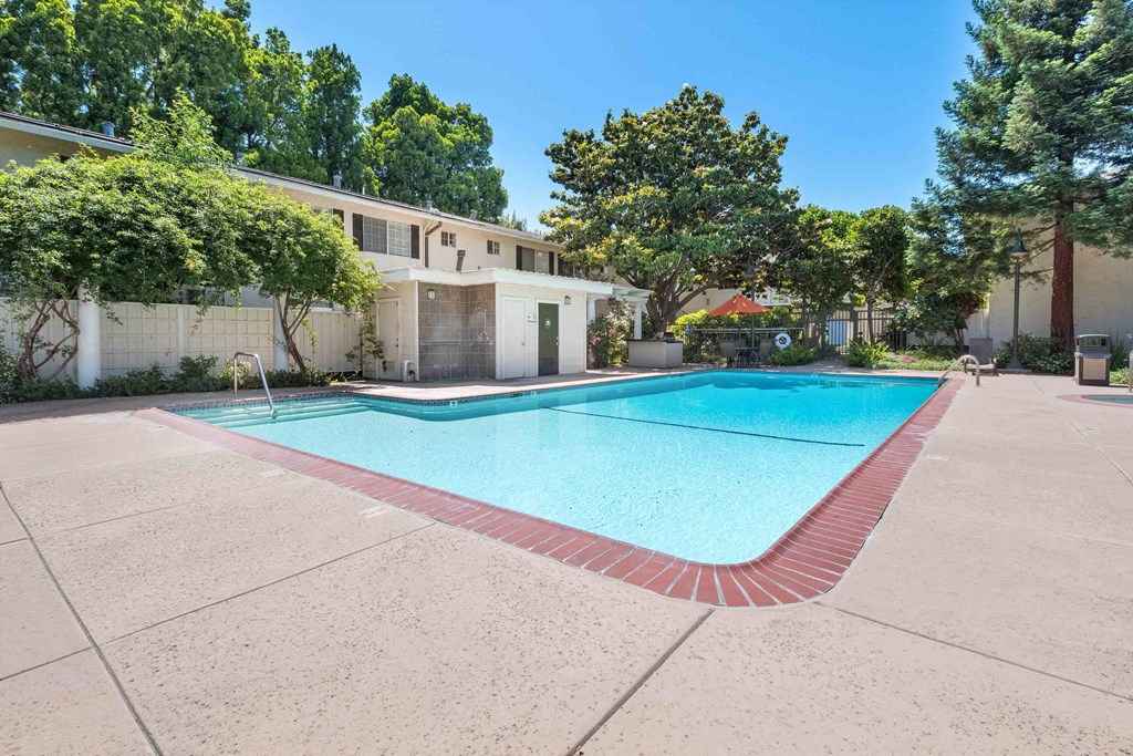 Apartments for Rent in San Jose CA - Los Gatos Creek - Pool with Poolside Restrooms Surrounded by Lush Landscaping