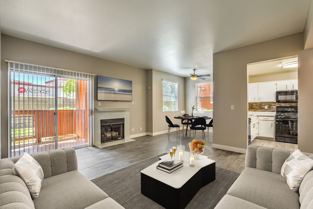 Madison at Black Mountain apartments photo of a living room with a fireplace and hardwood floors