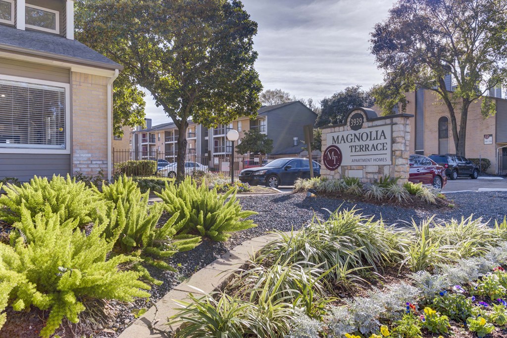 Property sign for Magnolia Terrace, a pet-friendly apartment community in Far West Houston, Houston, TX.