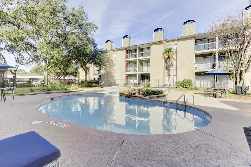 Resort-style swimming pool at Magnolia Terrace, a pet-friendly apartment community in Far West Houston, Houston, TX.